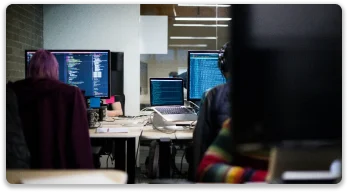 person sitting on chair and writing web development code